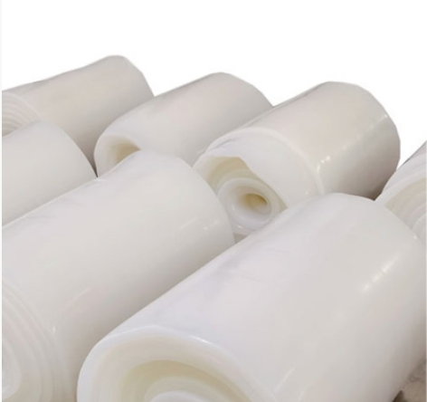 What is the difference between a commercial rubber and a specified grade of rubber?